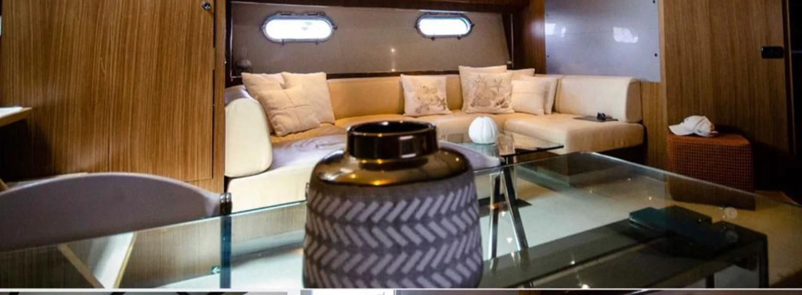a living room with a fireplace aboard ALTER EGO Yacht for Sale