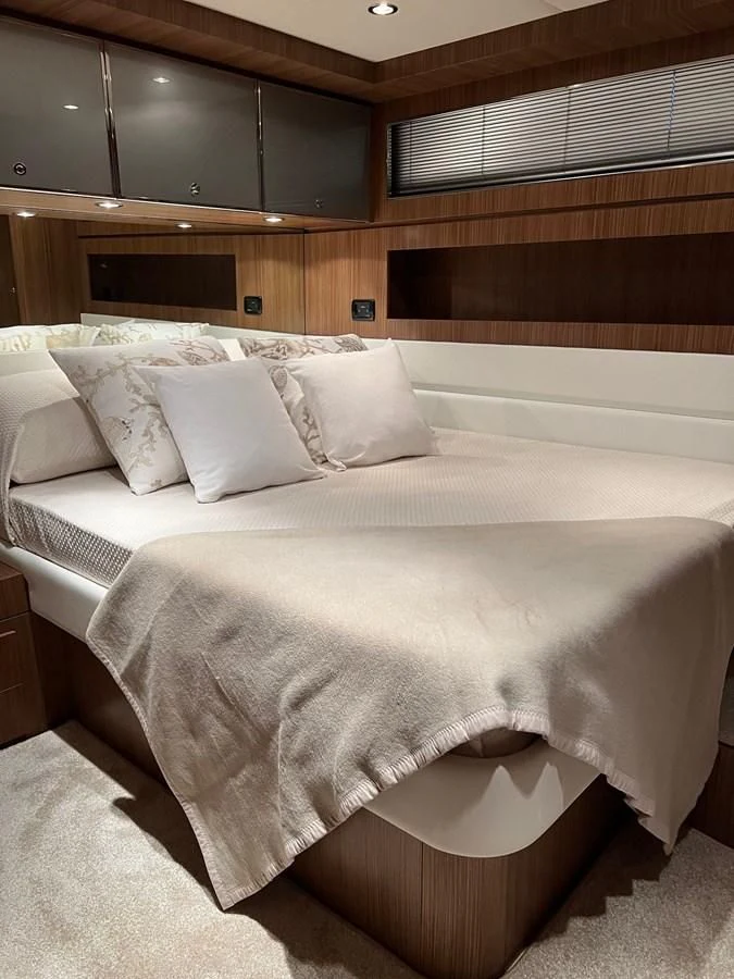 a bed with white sheets aboard ALTER EGO Yacht for Sale