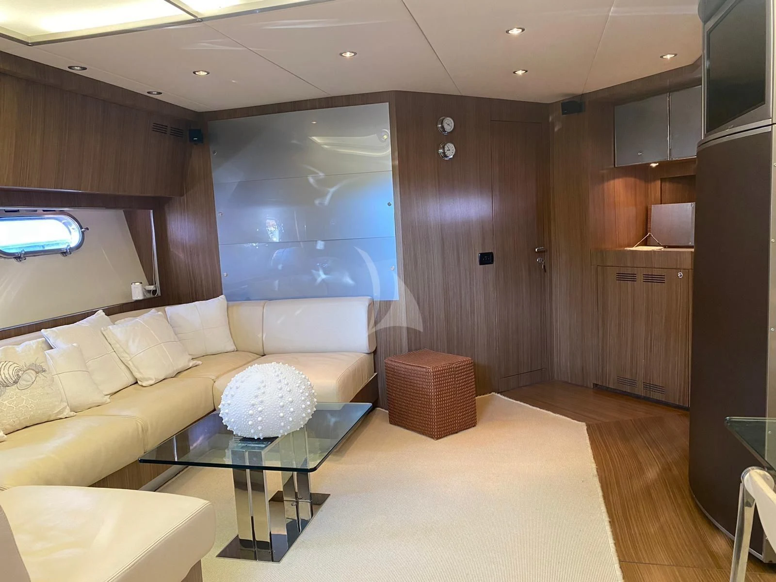 a living room with a couch and a table aboard ALTER EGO Yacht for Sale