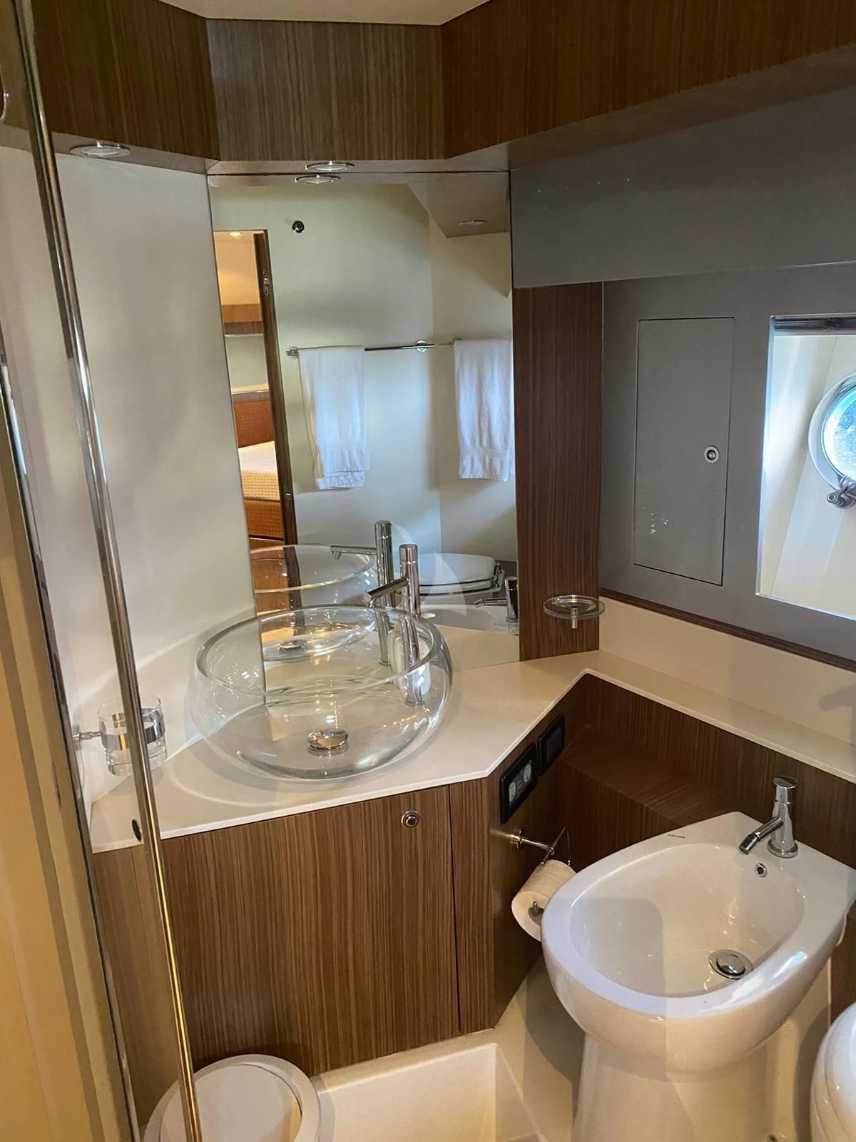 a bathroom with a glass shower aboard ALTER EGO Yacht for Sale