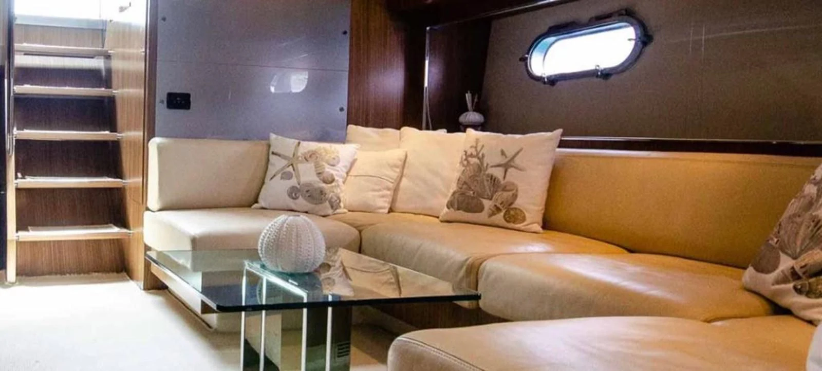 a couch with pillows aboard ALTER EGO Yacht for Sale