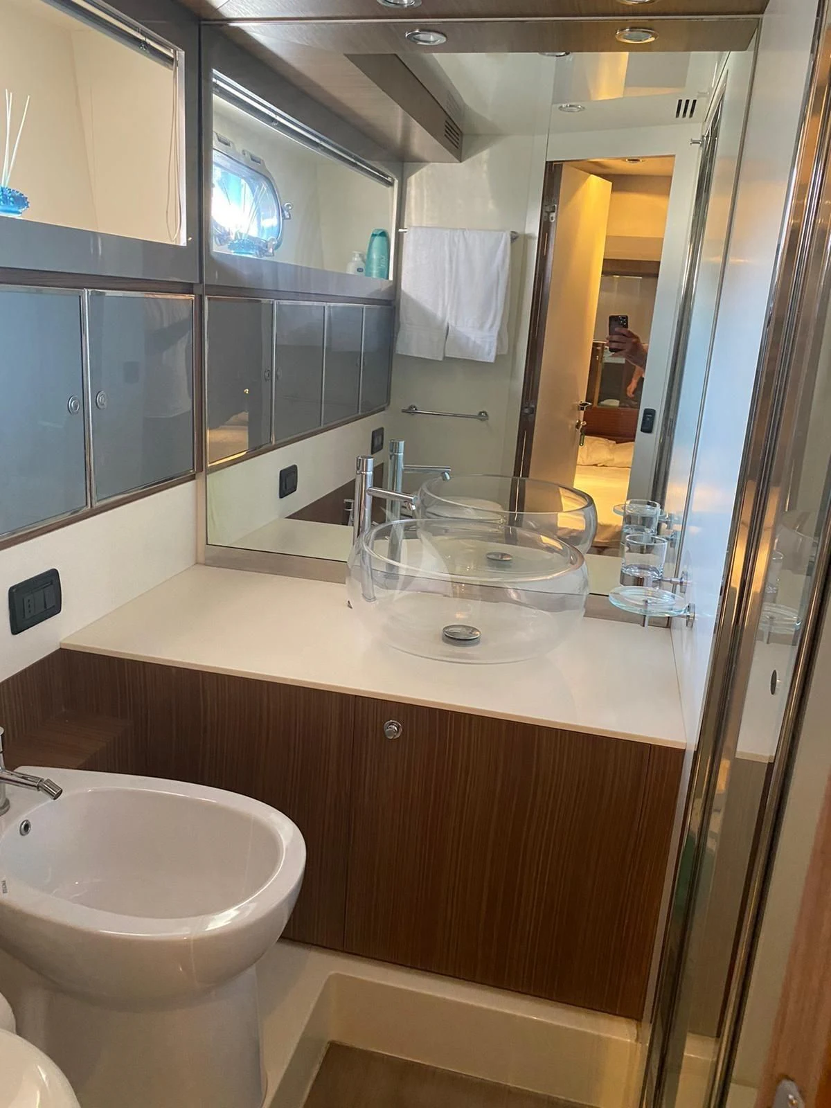 a bathroom with a large mirror aboard ALTER EGO Yacht for Sale