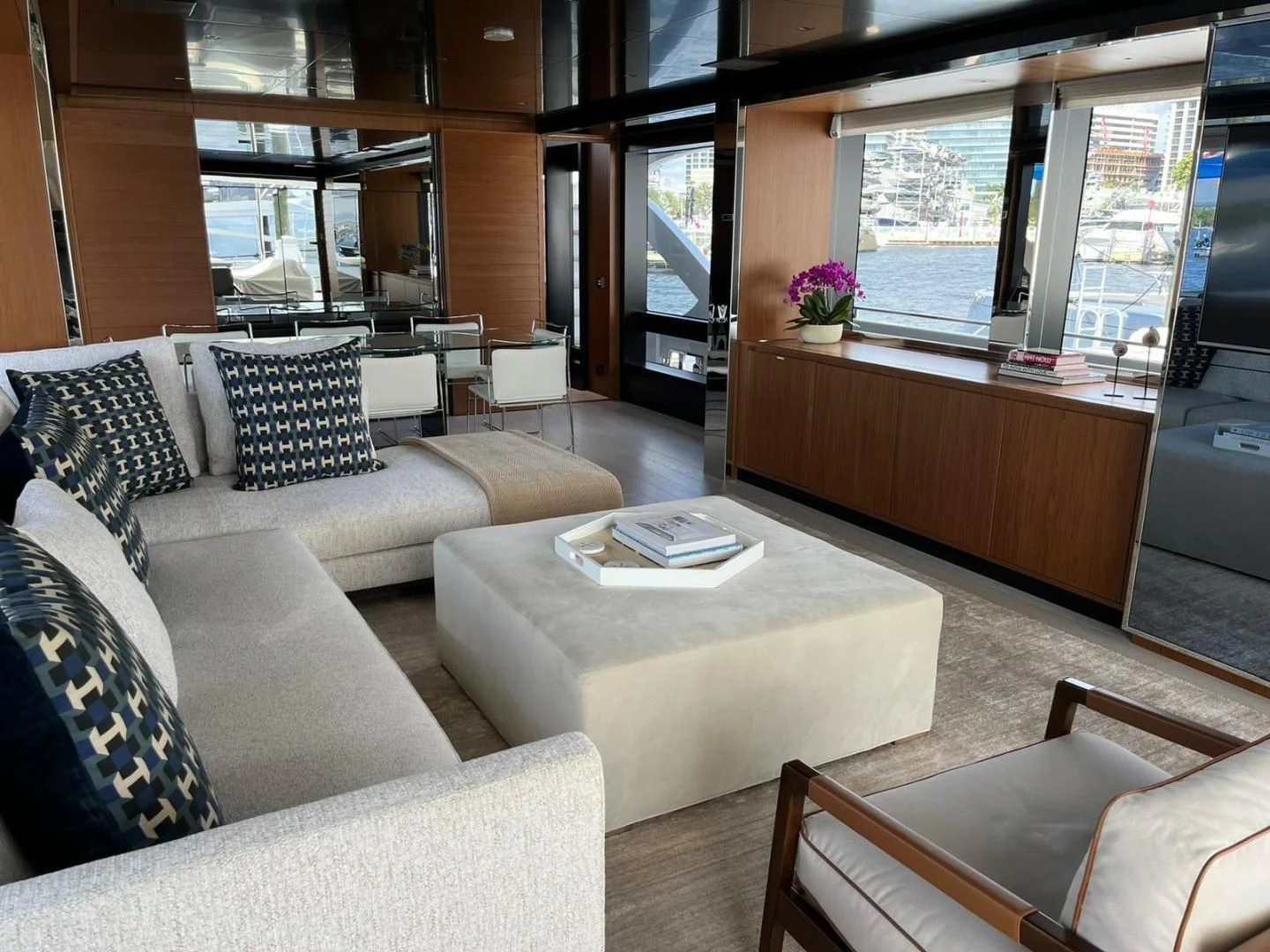 a living room with a large window aboard KIYOMIZU Yacht for Sale