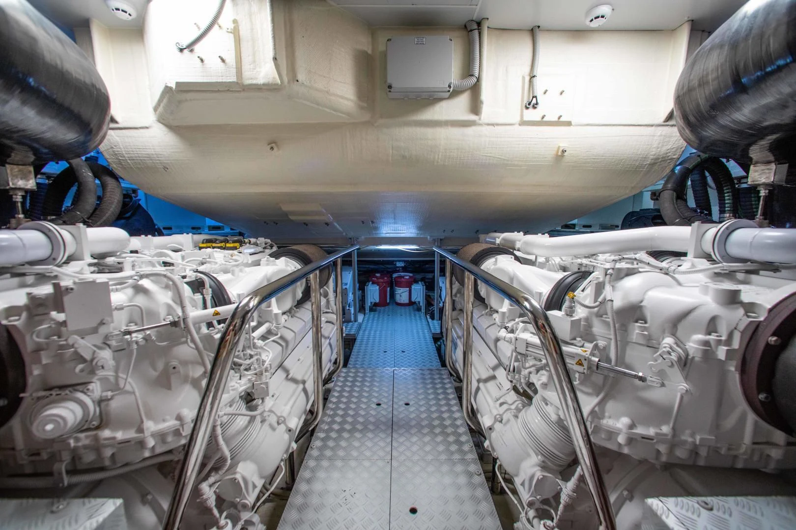 a large room with several large white machines aboard KIYOMIZU Yacht for Sale