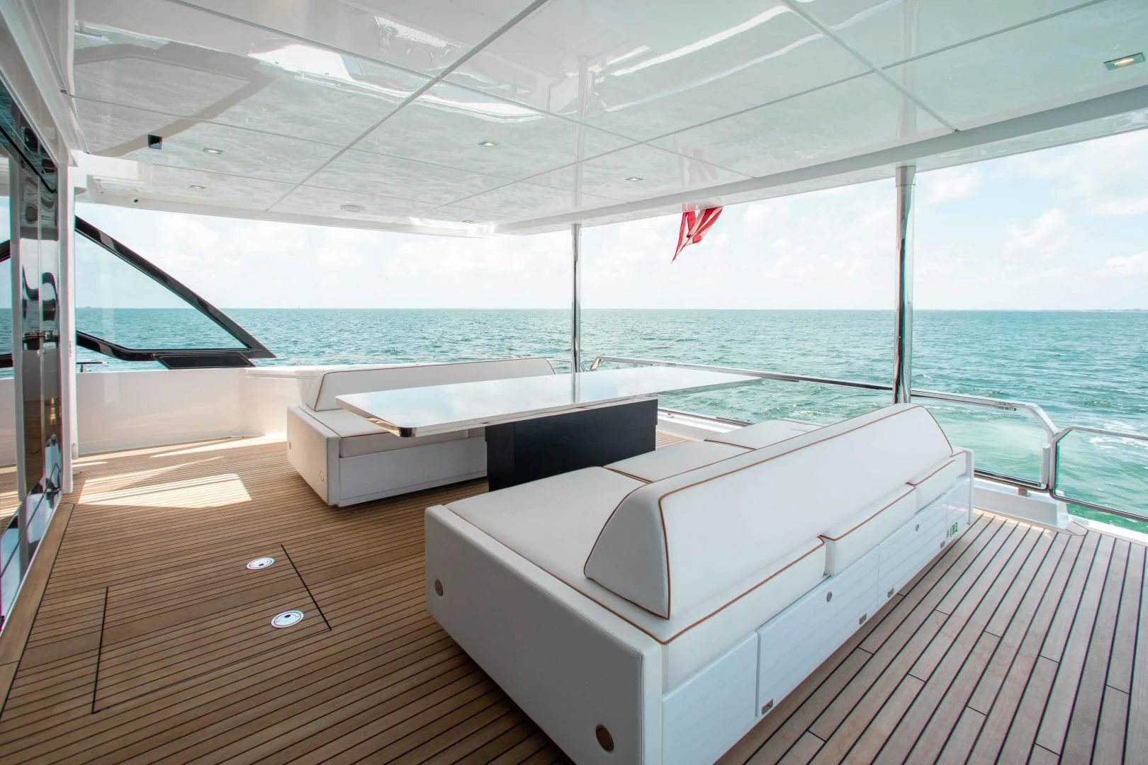 a room with a large bed and a large body of water aboard KIYOMIZU Yacht for Sale