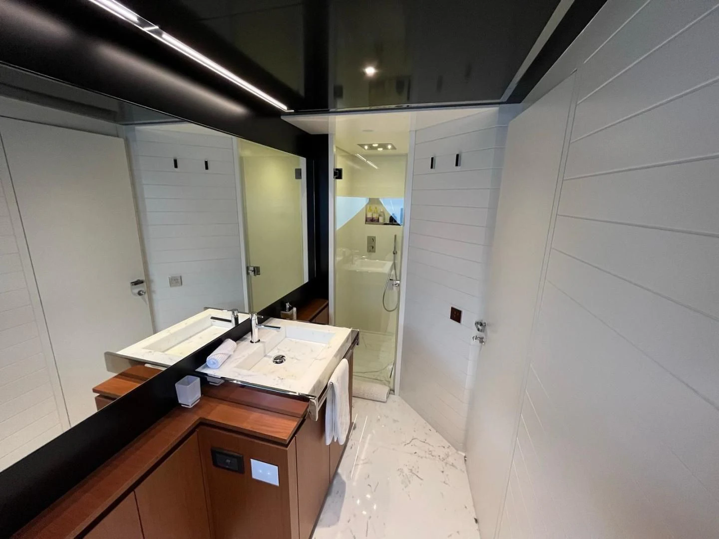 a room with a counter and cabinets aboard KIYOMIZU Yacht for Sale