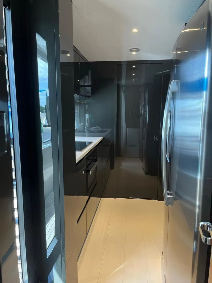 a hallway with doors aboard KIYOMIZU Yacht for Sale