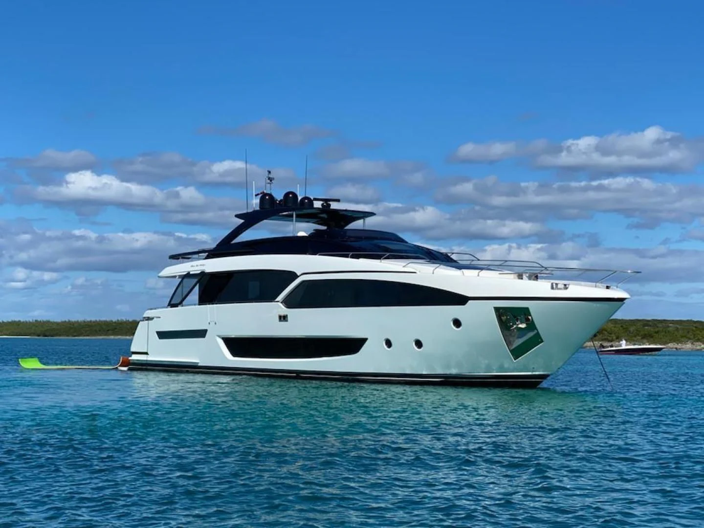 a white yacht in the water aboard KIYOMIZU Yacht for Sale