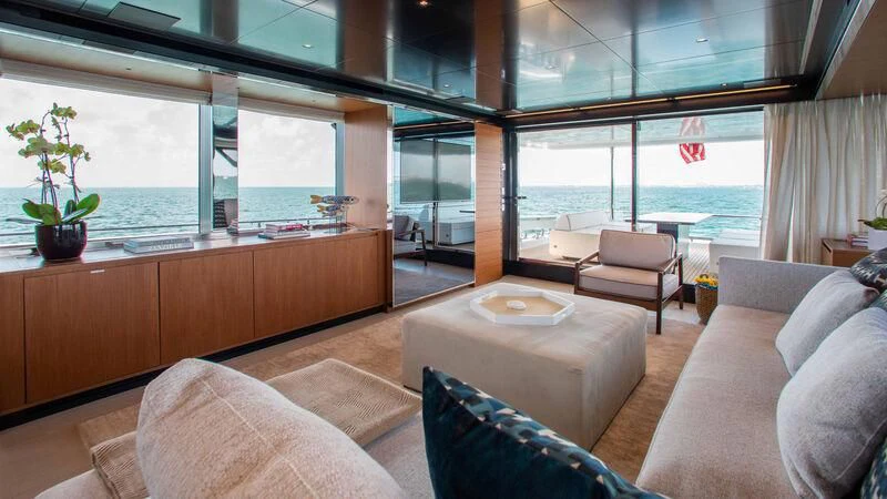 a living room with a large window aboard KIYOMIZU Yacht for Sale