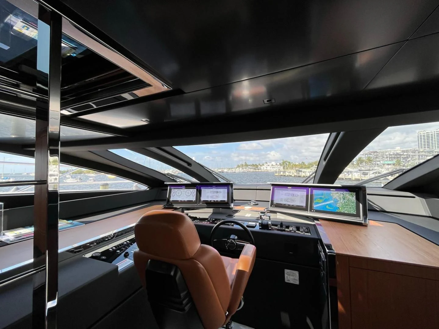 inside of a vehicle with a view of the water and a city aboard KIYOMIZU Yacht for Sale
