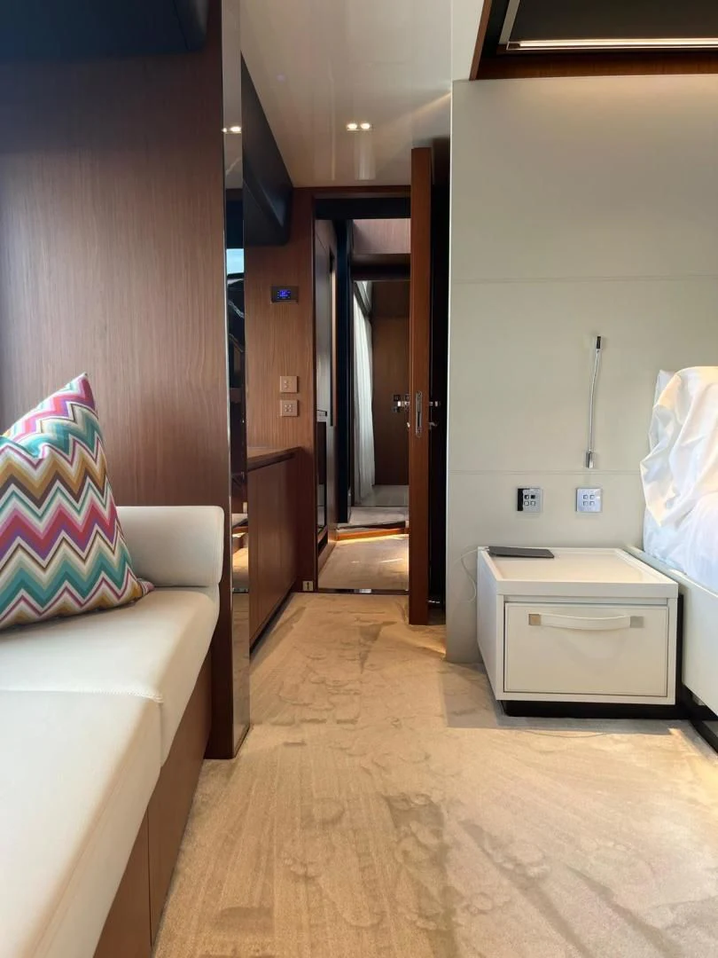 a room with a bed and a desk aboard KIYOMIZU Yacht for Sale