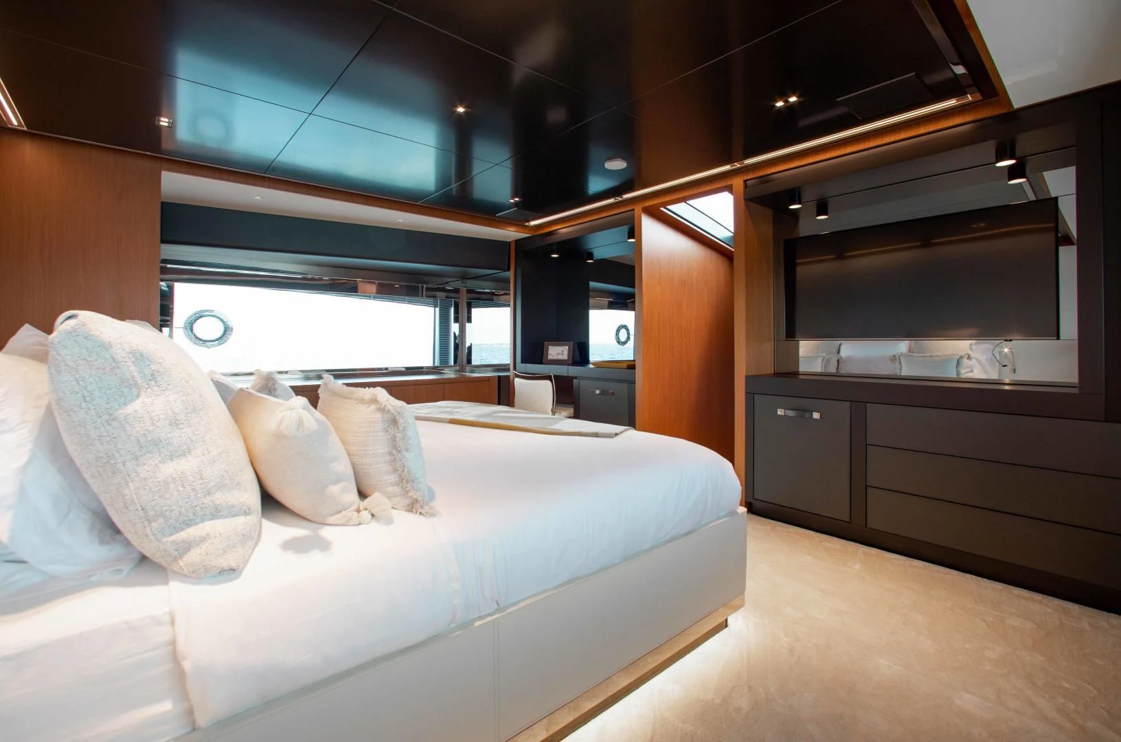 a room with a bed and a desk aboard KIYOMIZU Yacht for Sale