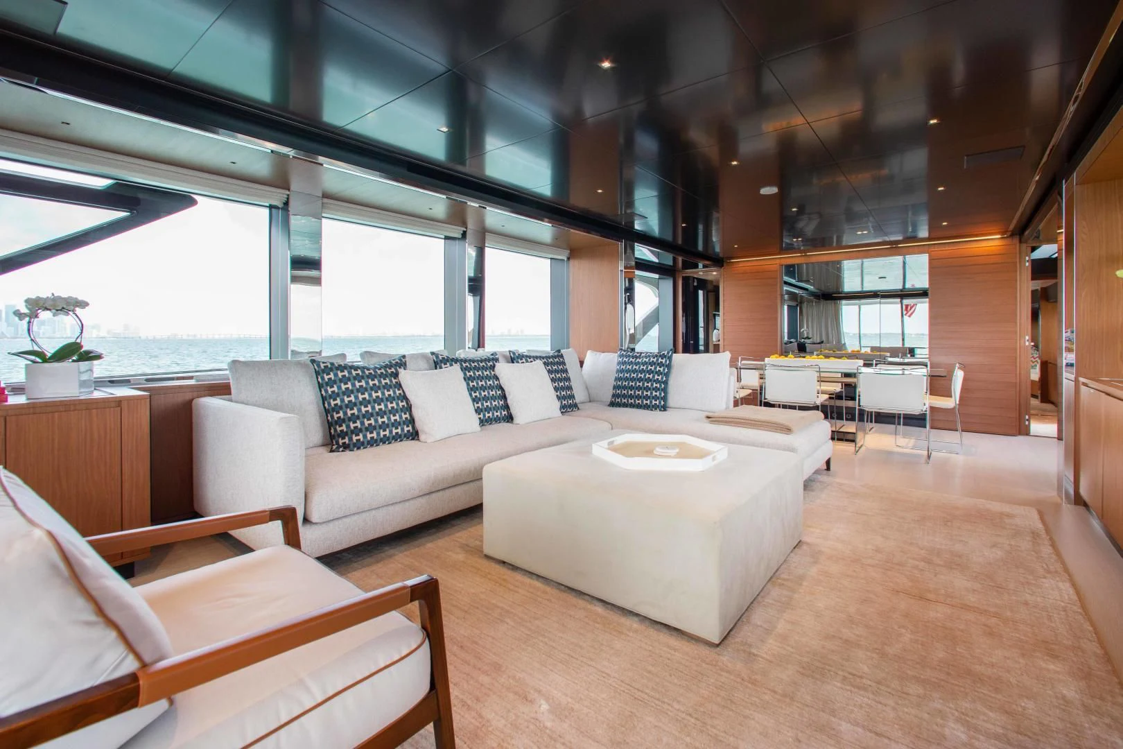 a living room with a large window aboard KIYOMIZU Yacht for Sale