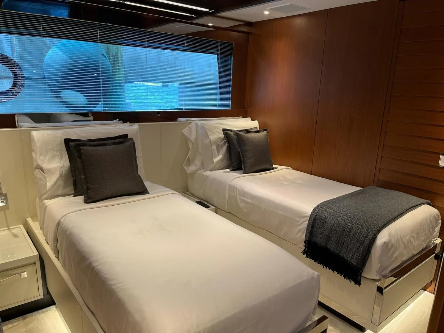 a room with two beds aboard KIYOMIZU Yacht for Sale