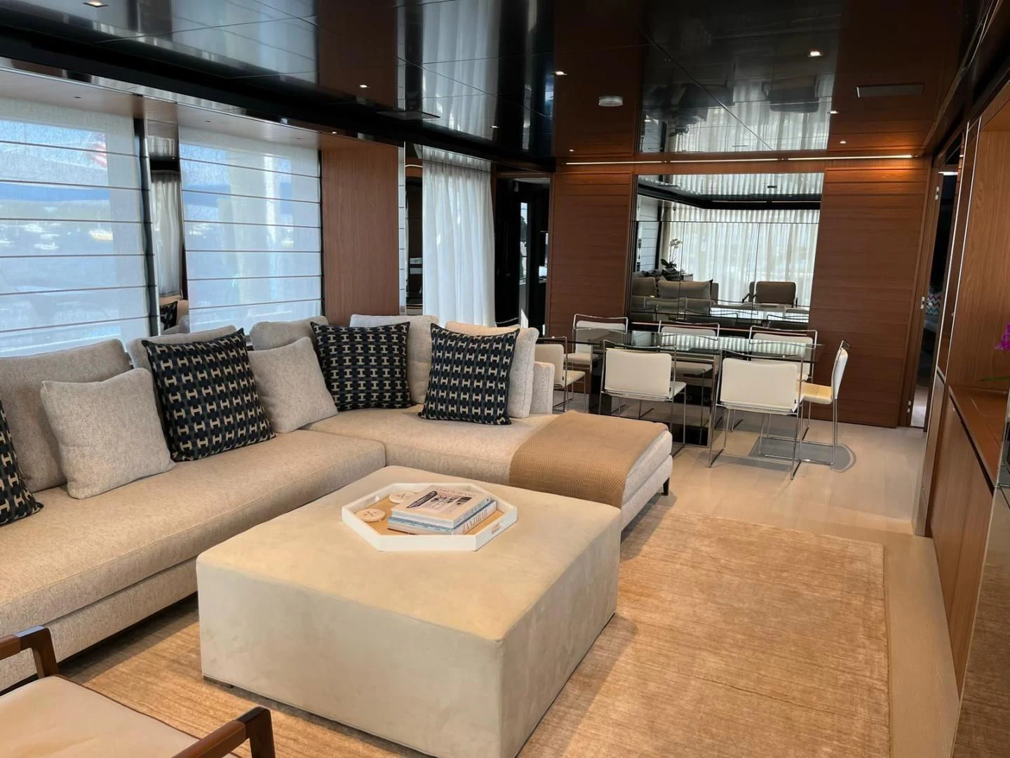 a living room with a couch and a coffee table aboard KIYOMIZU Yacht for Sale