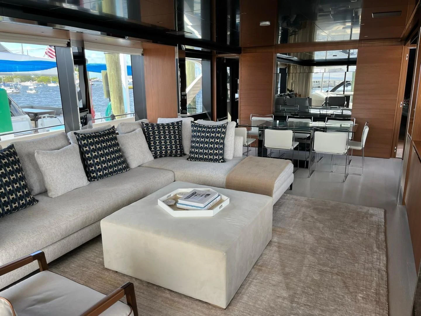 a living room with a couch and a table aboard KIYOMIZU Yacht for Sale