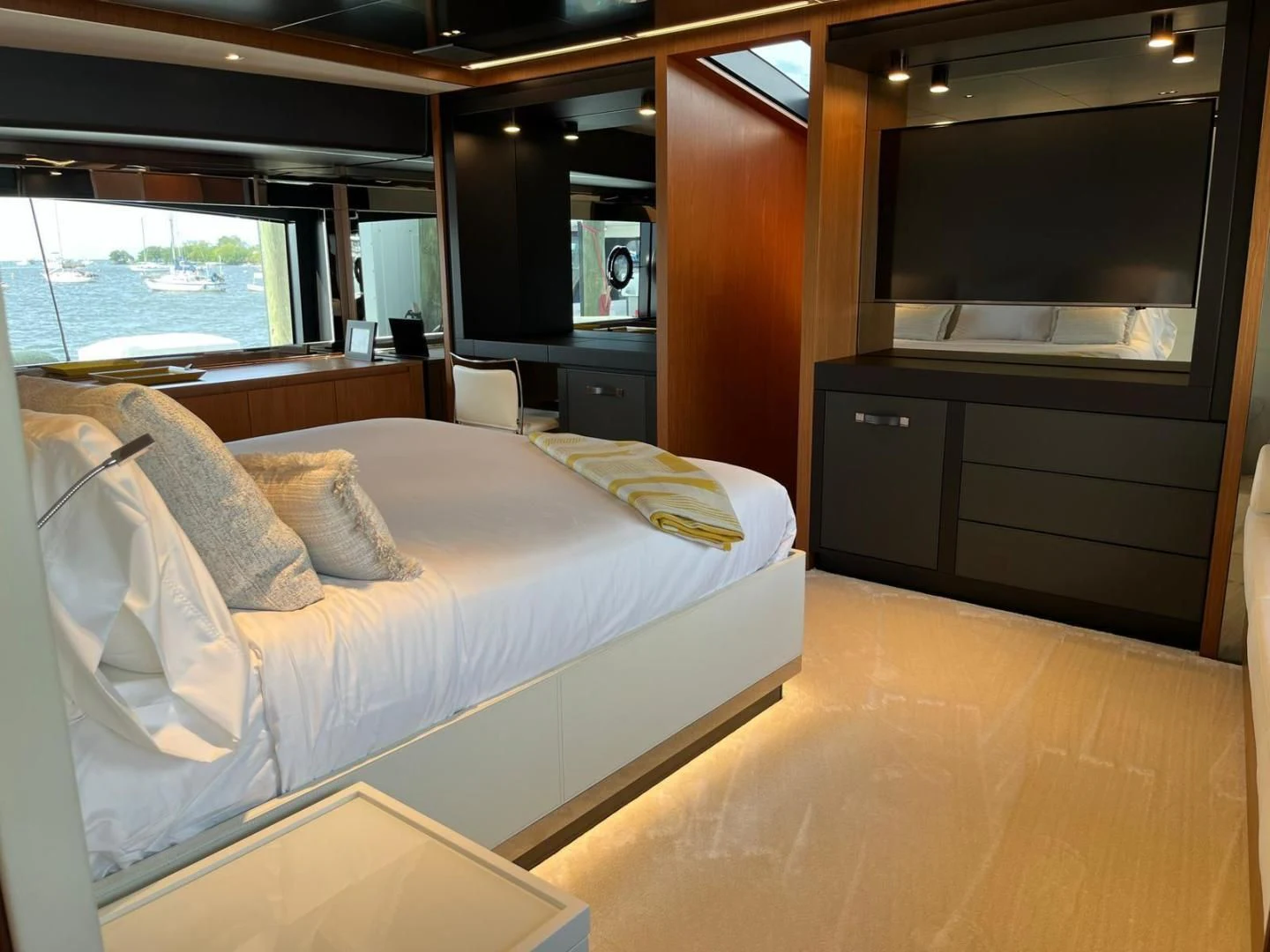 a bed in a room aboard KIYOMIZU Yacht for Sale