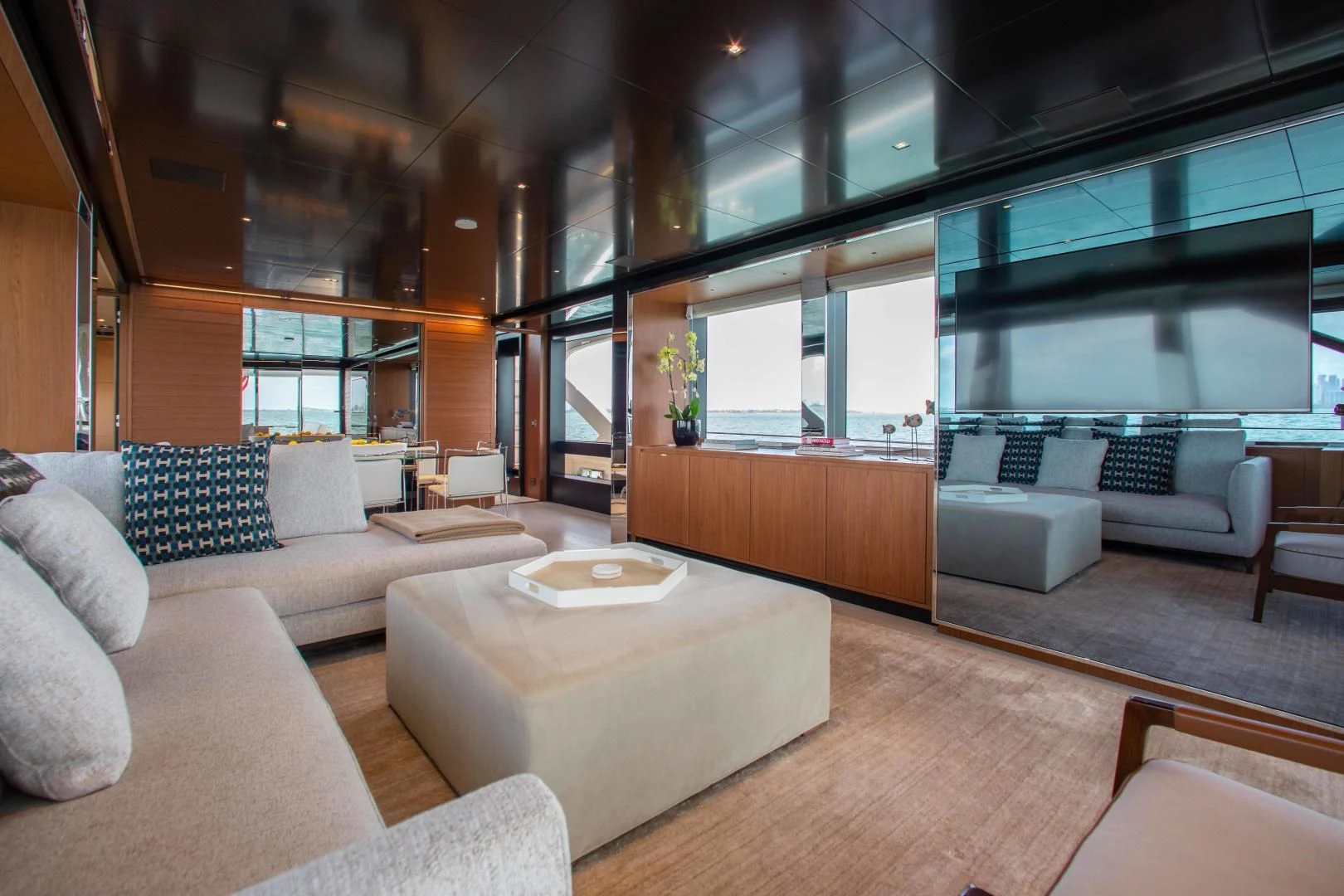a living room with a large window aboard KIYOMIZU Yacht for Sale