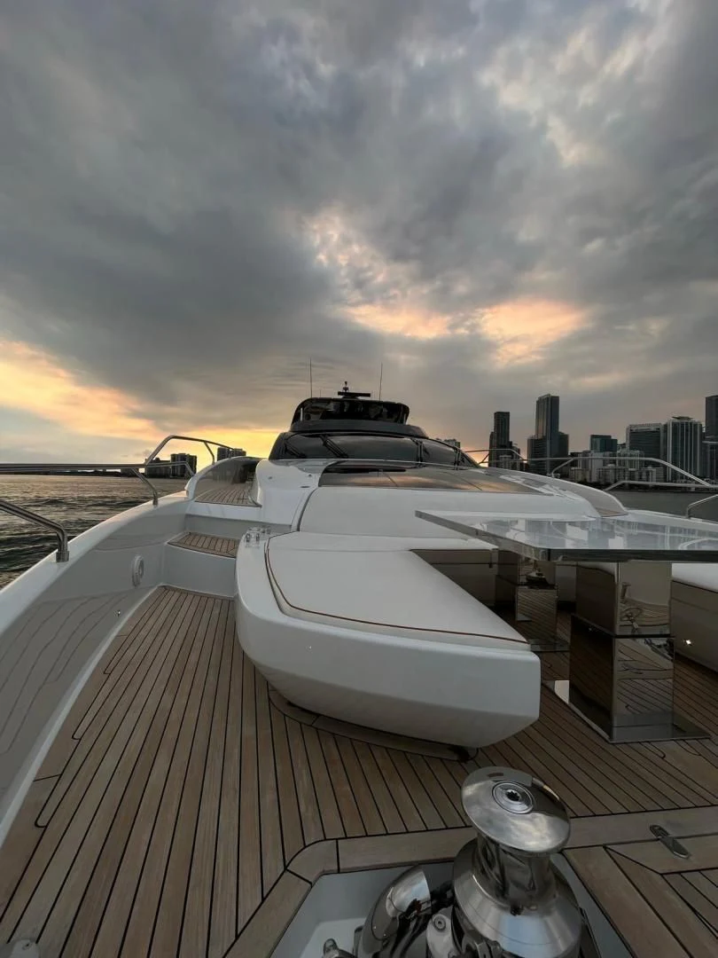 a large white yacht on a deck aboard KIYOMIZU Yacht for Sale