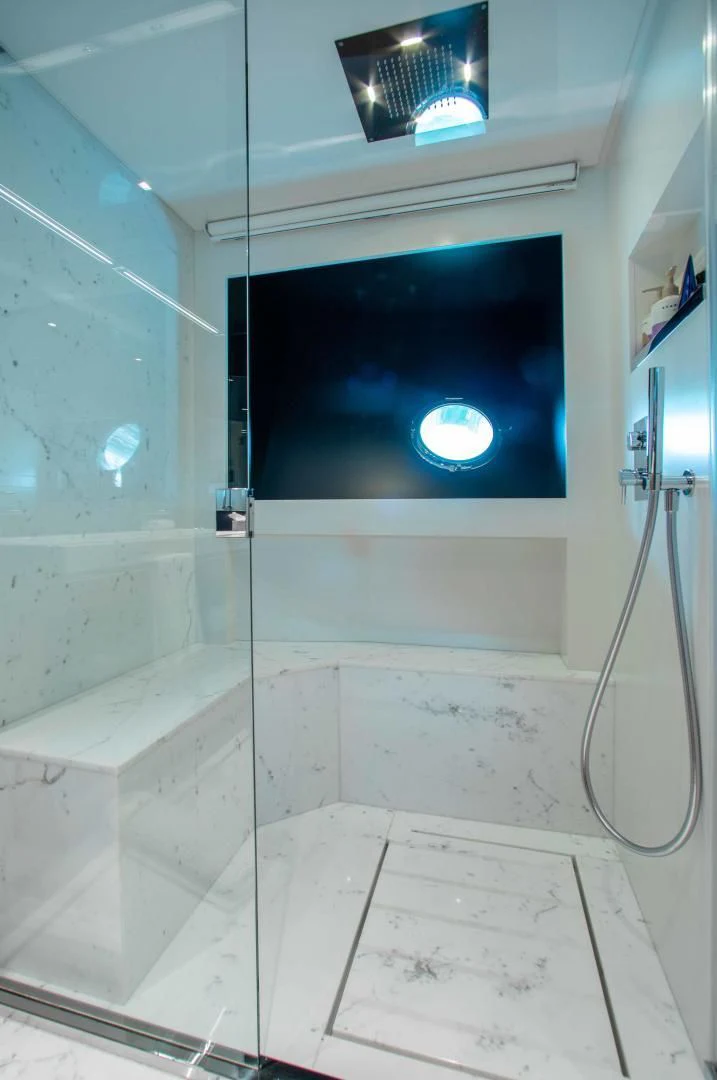 a room with a blue screen aboard KIYOMIZU Yacht for Sale