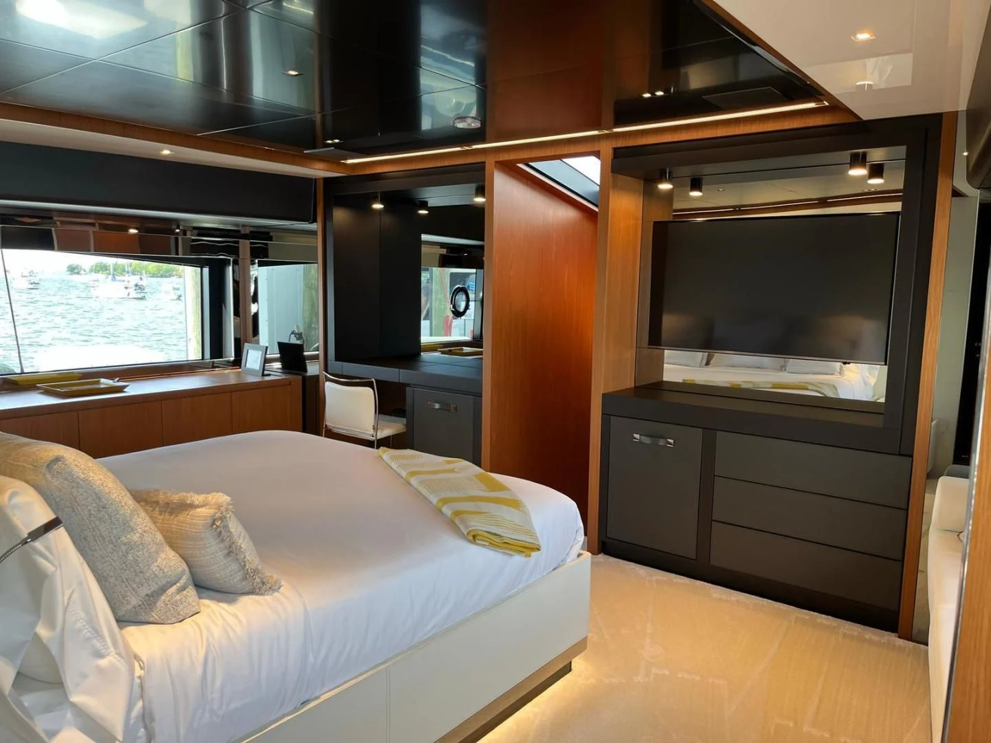 a room with a bed and a tv aboard KIYOMIZU Yacht for Sale