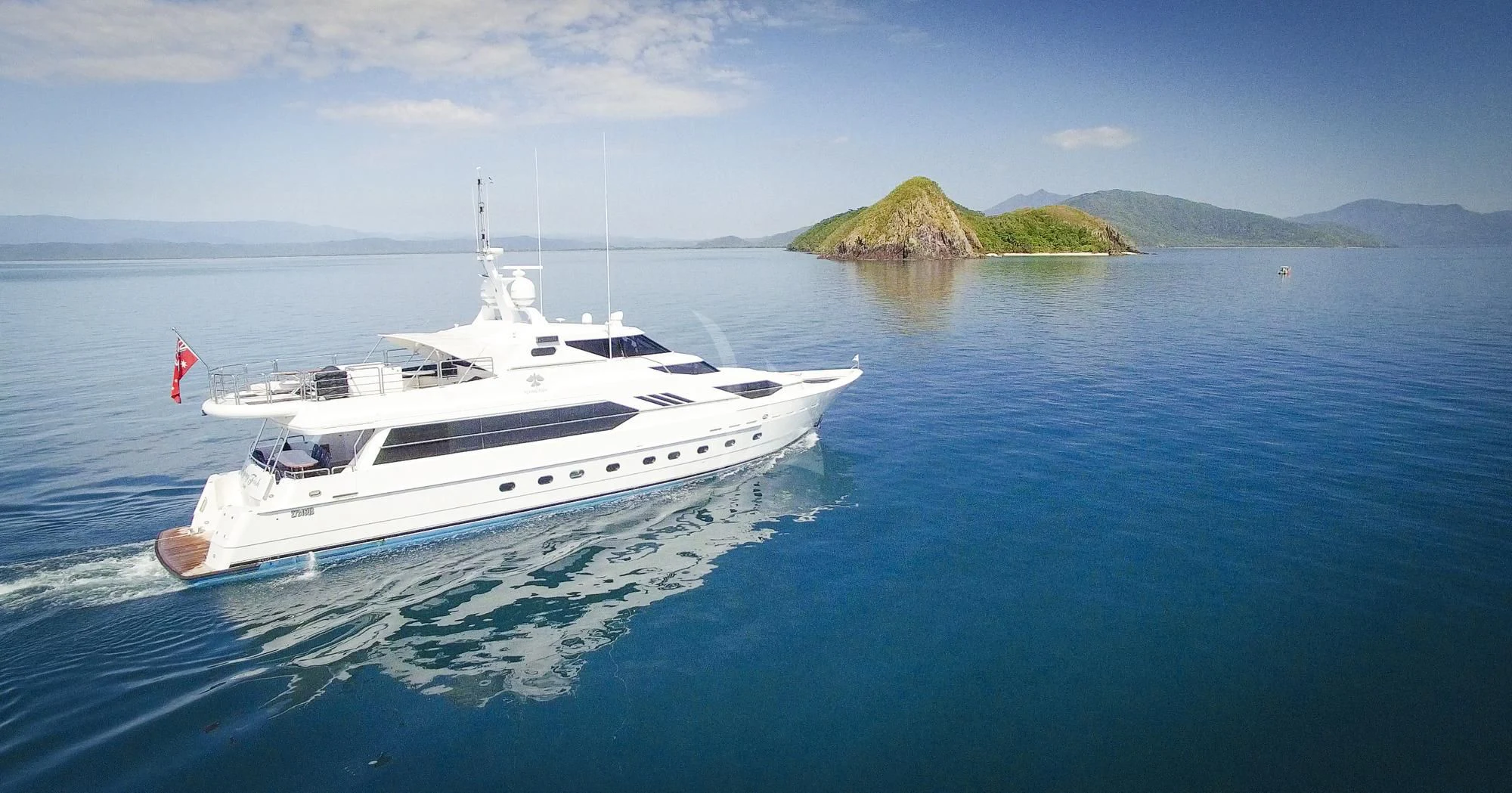 a boat on the water aboard FLYING FISH Yacht for Sale