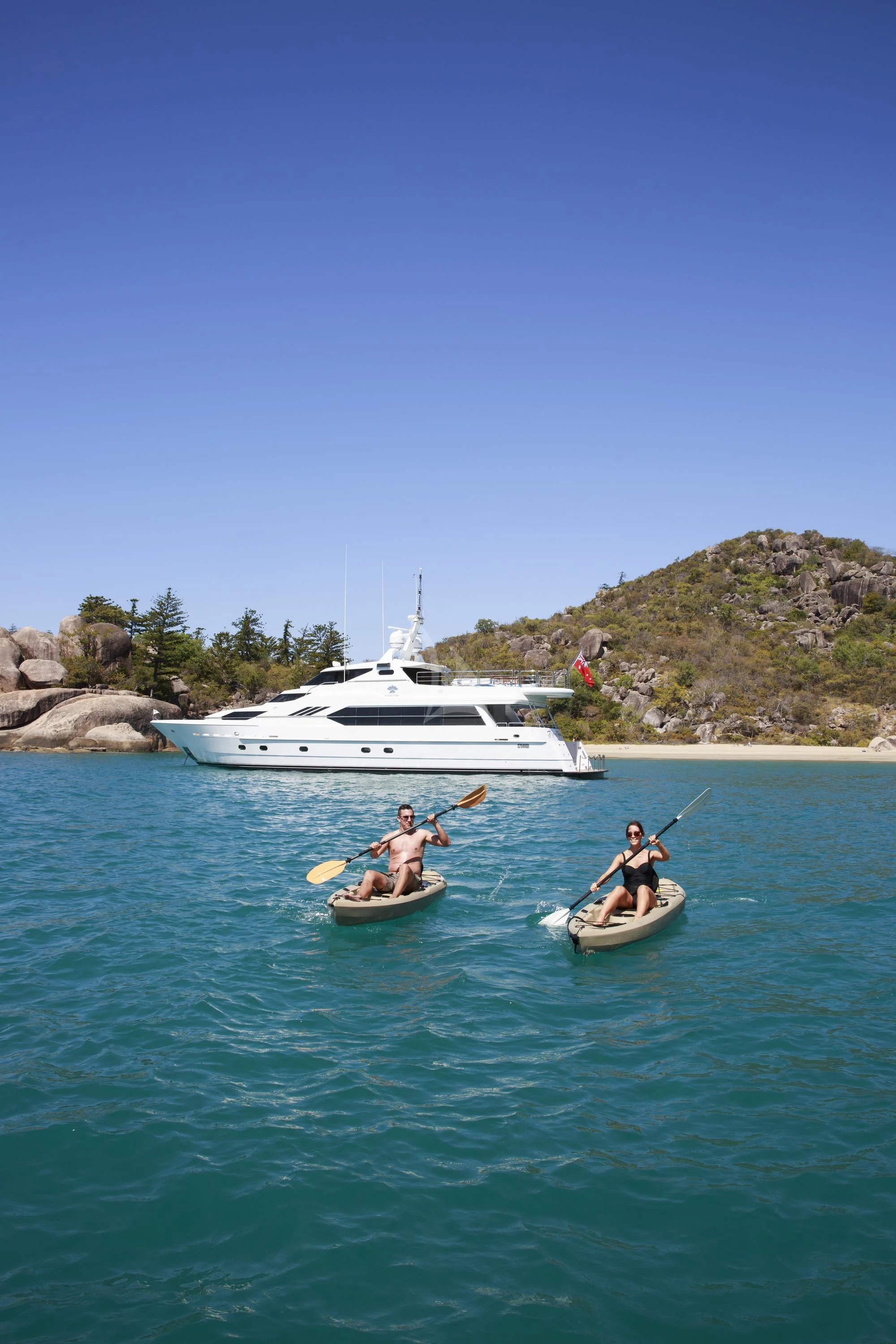 a group of people in boats on a lake aboard FLYING FISH Yacht for Sale
