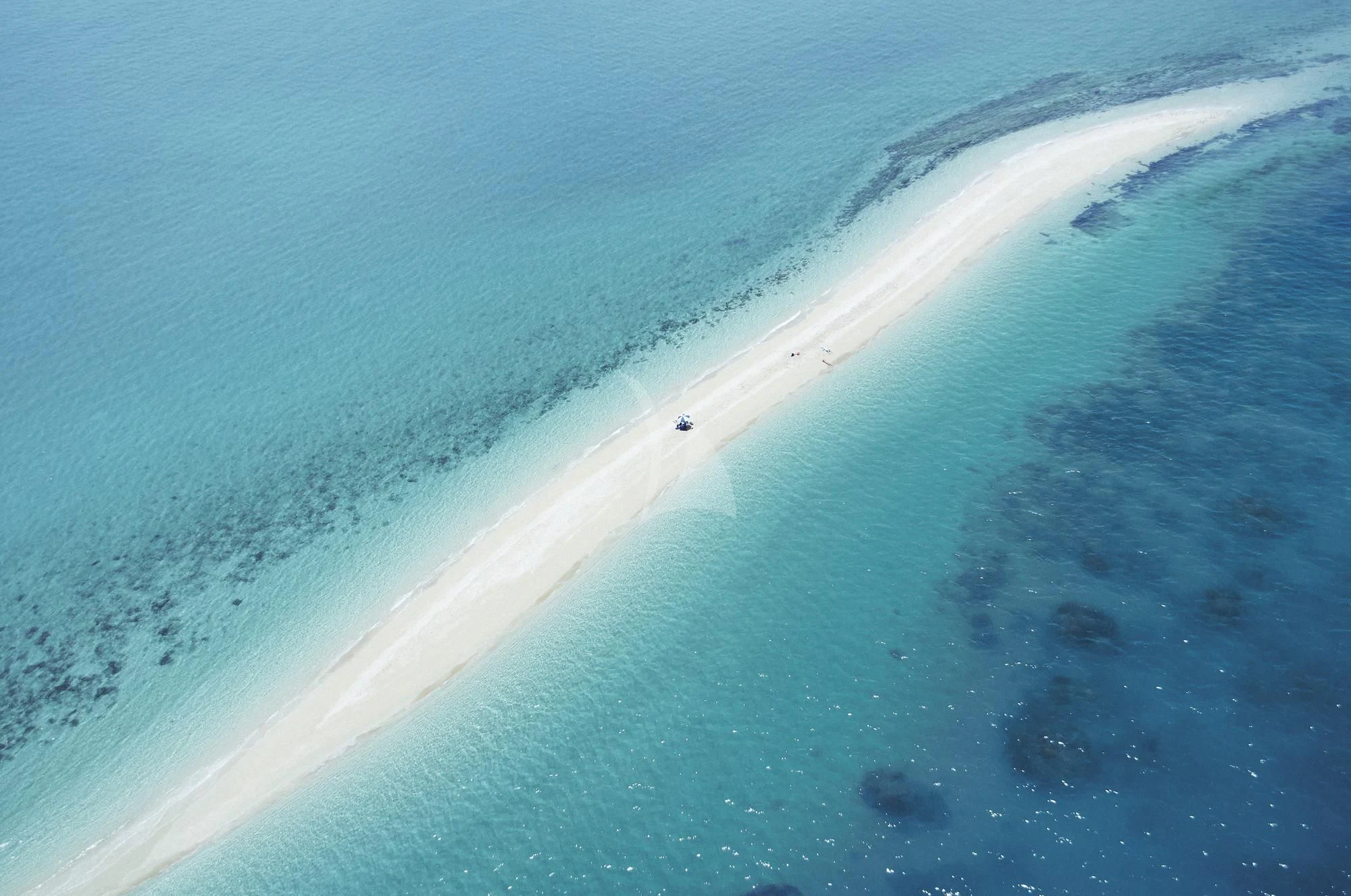 a beach with waves aboard FLYING FISH Yacht for Sale