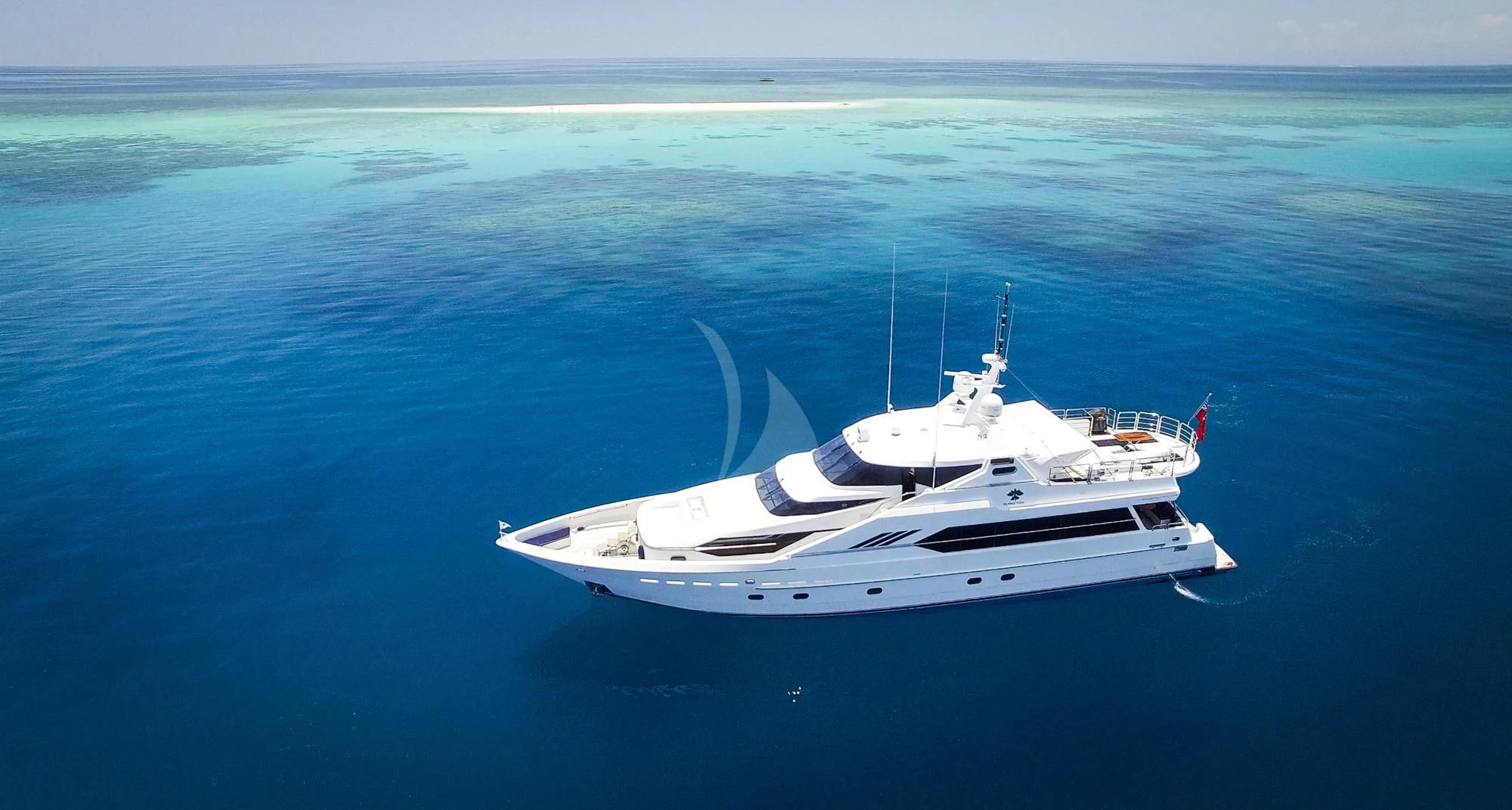 a boat in the water aboard FLYING FISH Yacht for Sale