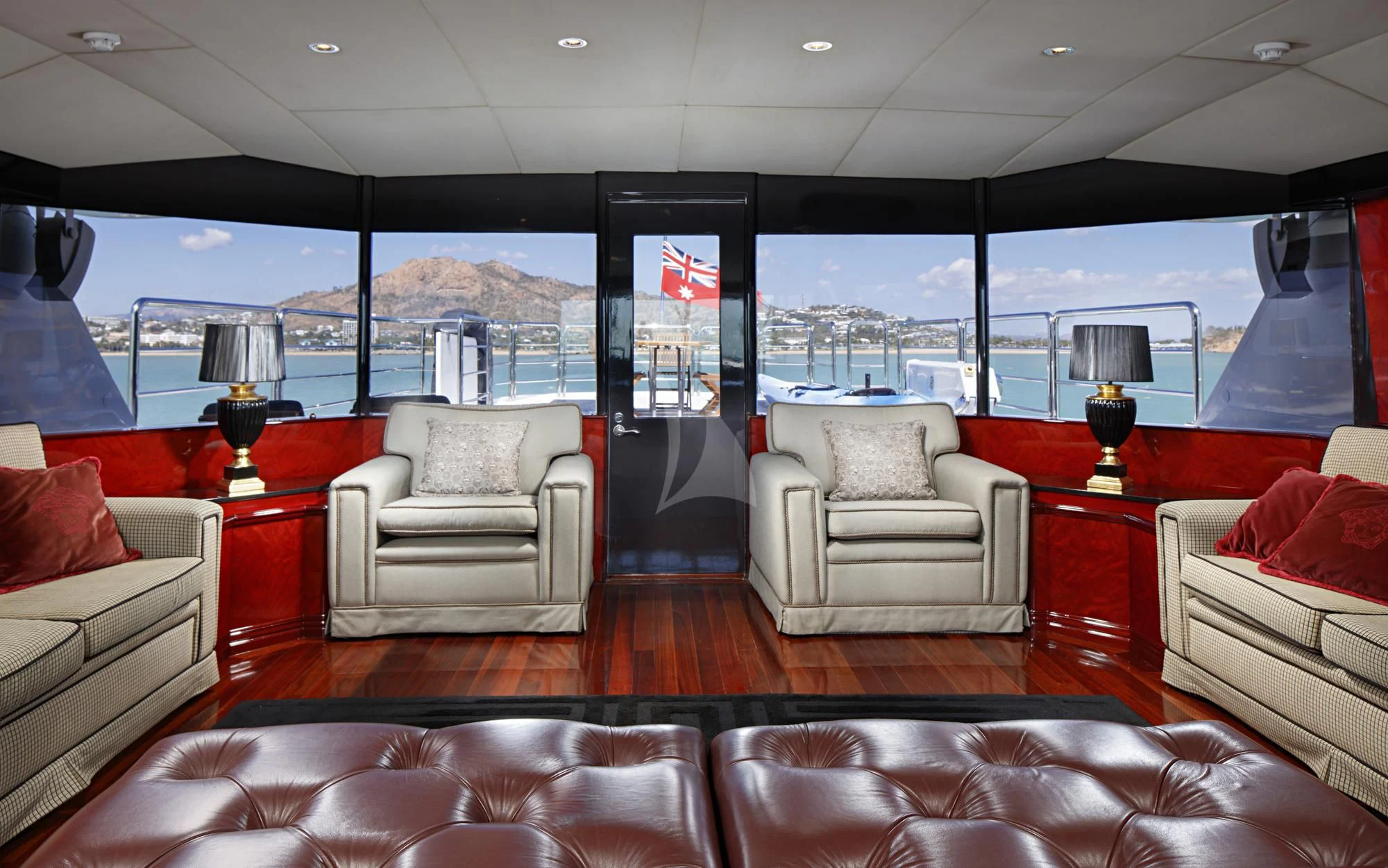 a living room with a large window aboard FLYING FISH Yacht for Sale