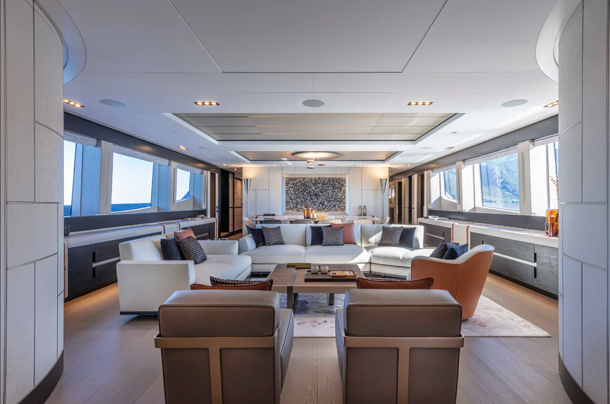 a living room with a large window aboard PERSHING 140 Yacht for Sale