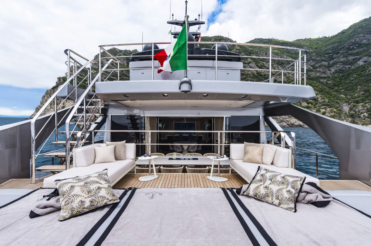 a large white boat on a body of water aboard PERSHING 140 Yacht for Sale
