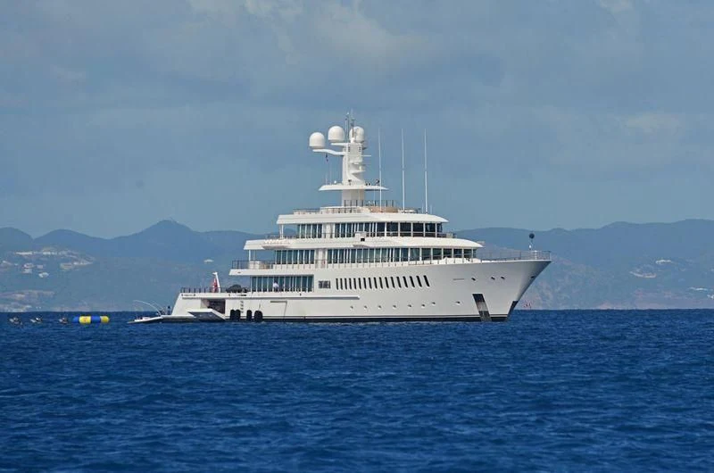 a large white boat in the water aboard FOUNTAINHEAD Yacht for Sale