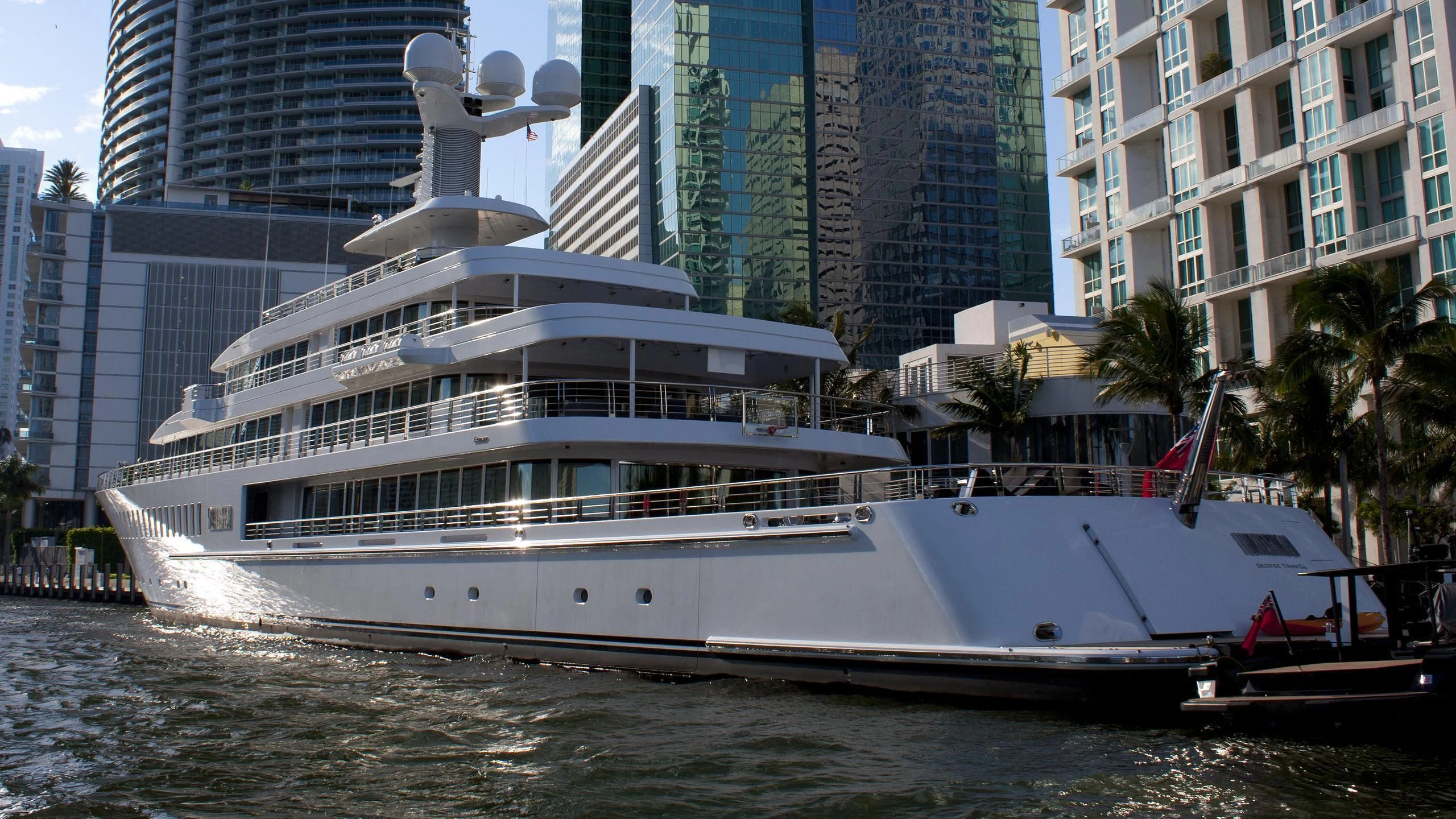 a large white boat in the water aboard FOUNTAINHEAD Yacht for Sale