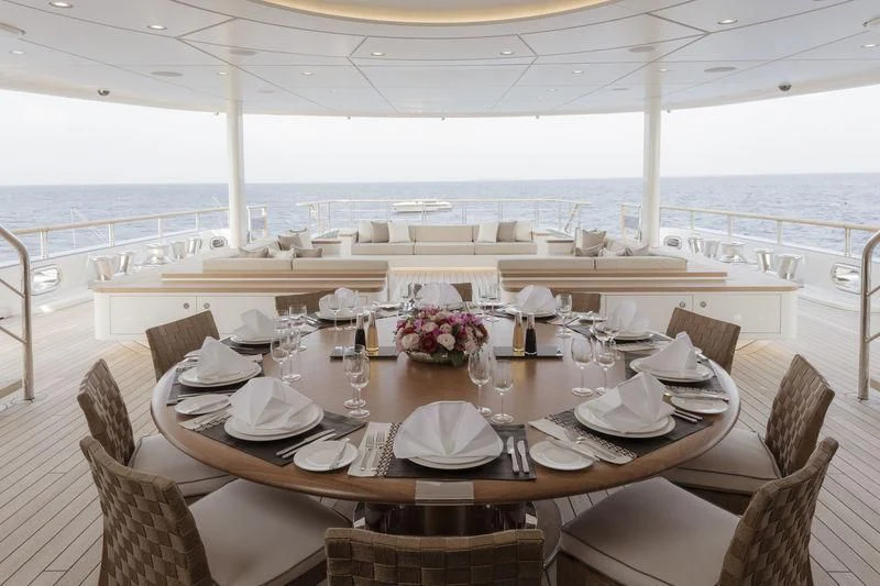 a table set for a dinner aboard DYTAN Yacht for Sale