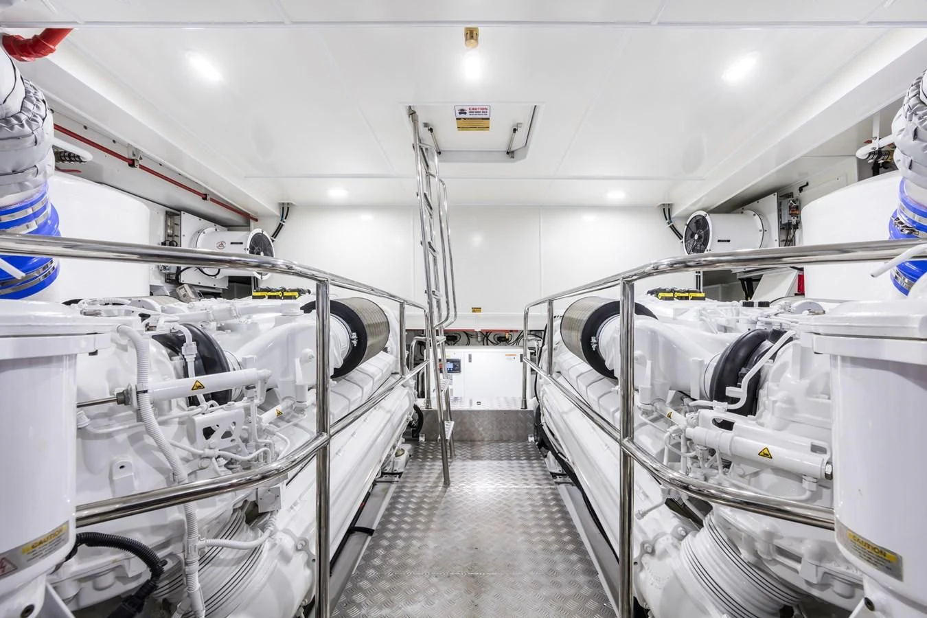 a room with white pipes aboard AMIRA Yacht for Sale