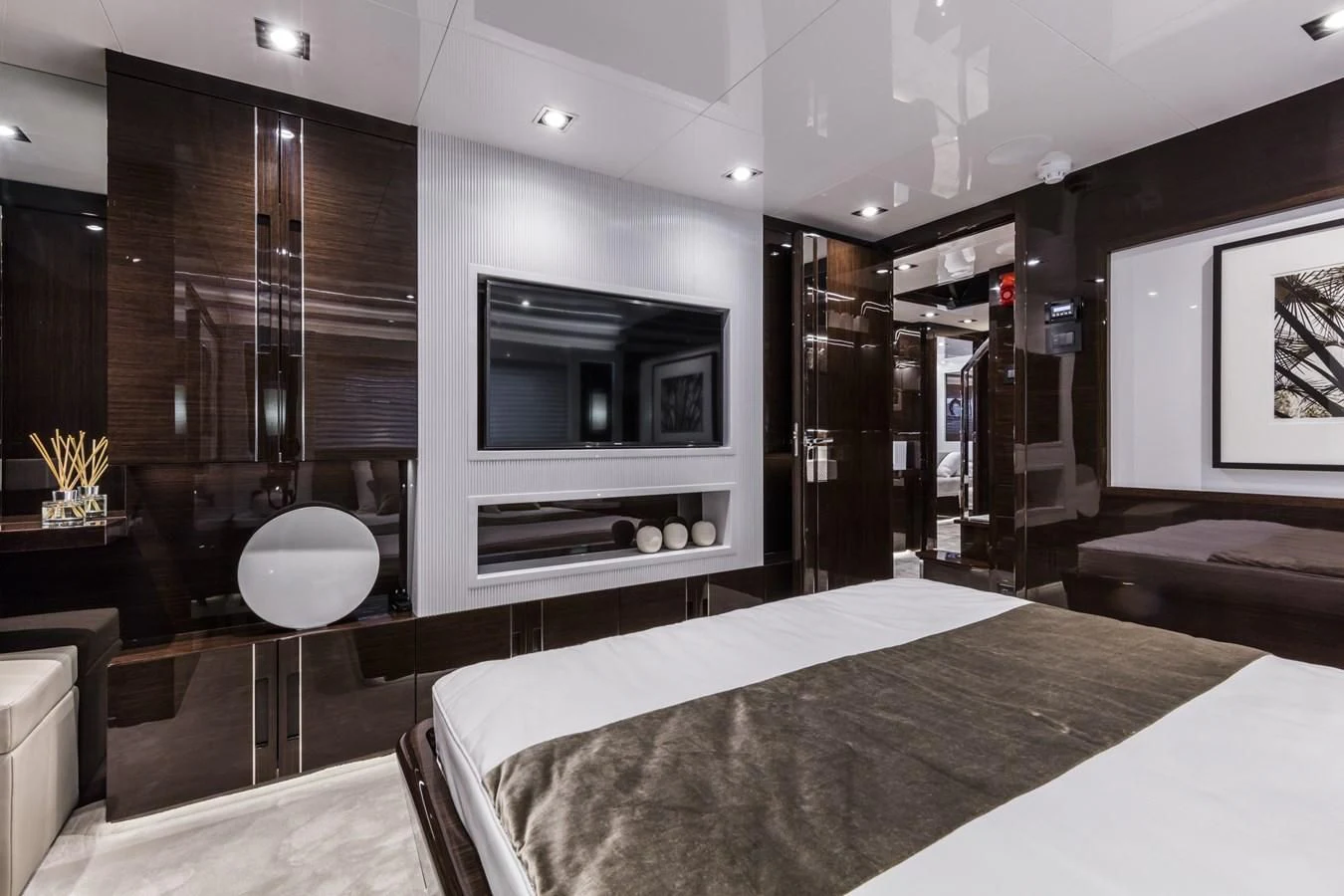 a room with a table and chairs aboard AMIRA Yacht for Sale