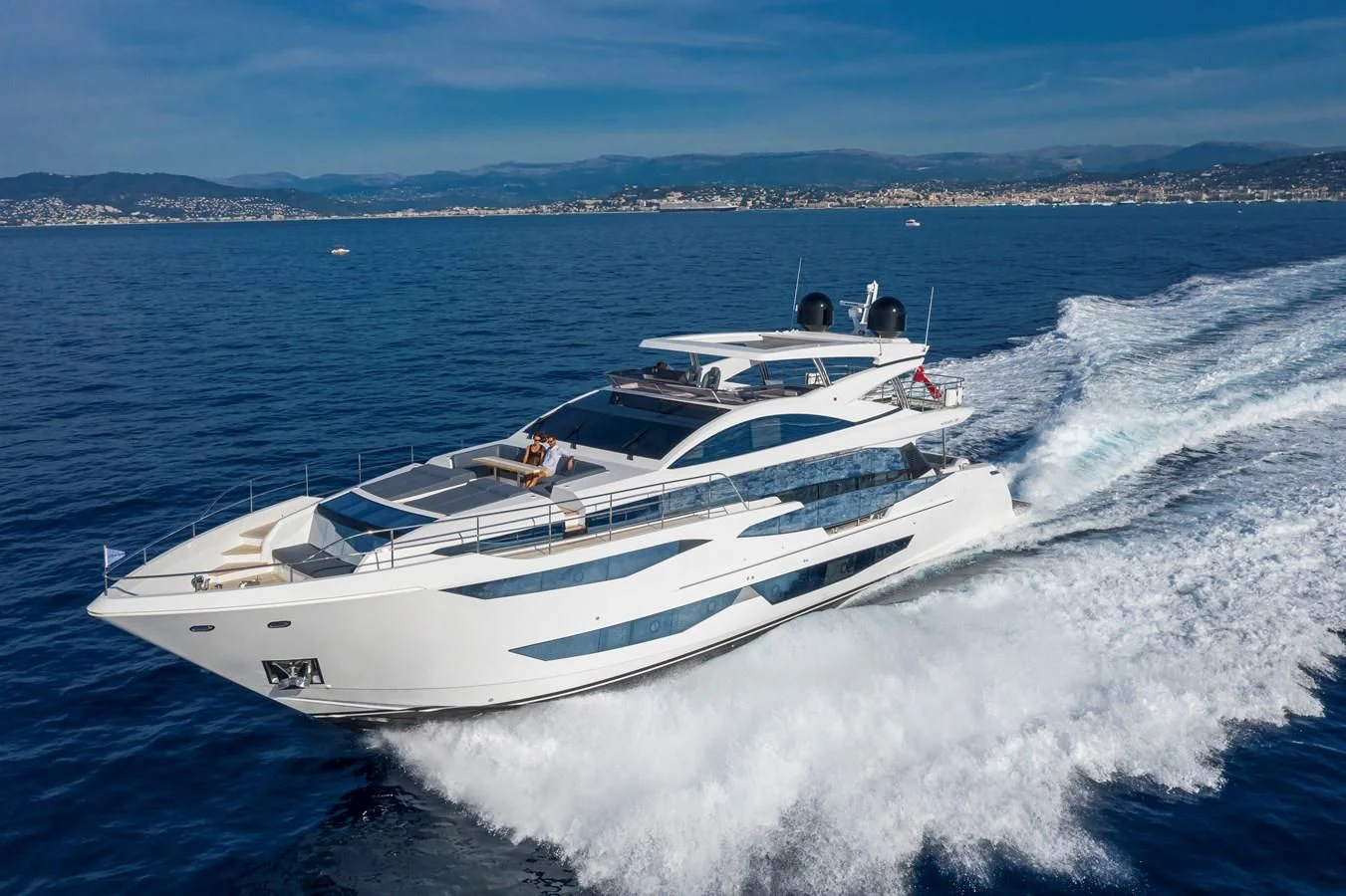 a white yacht on the water aboard AMIRA Yacht for Sale