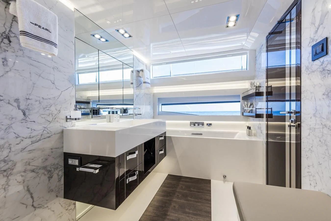 a room with a counter and sinks aboard AMIRA Yacht for Sale
