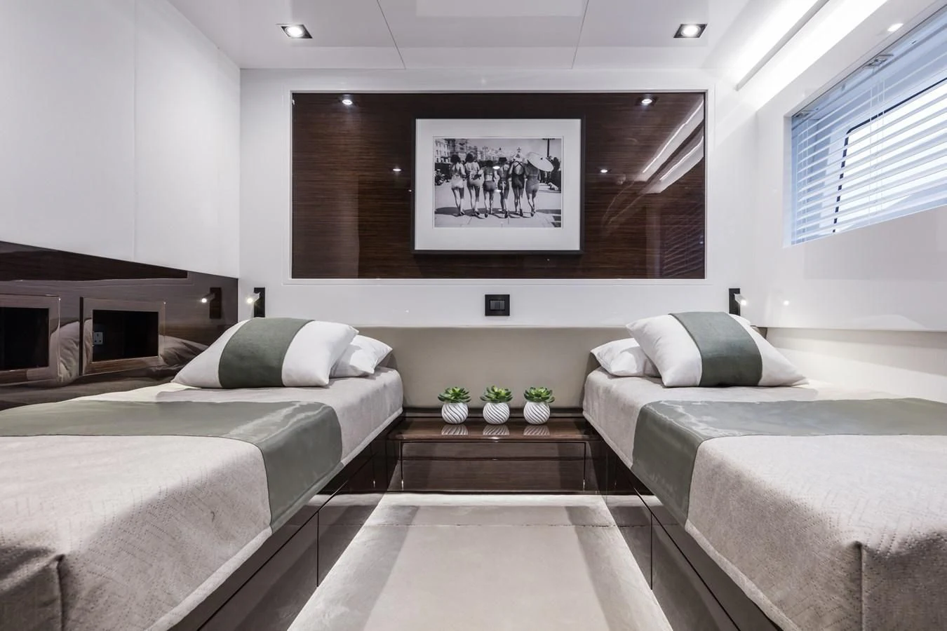 a room with two beds aboard AMIRA Yacht for Sale