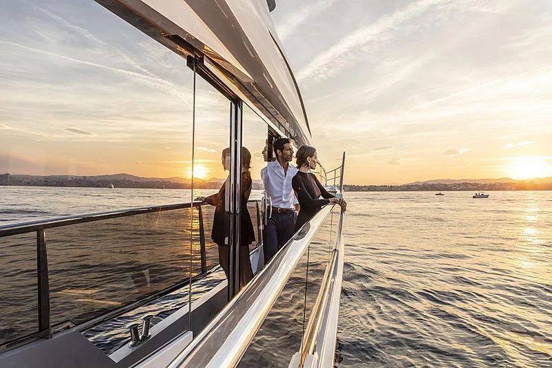 a group of people on a boat aboard AMIRA Yacht for Sale