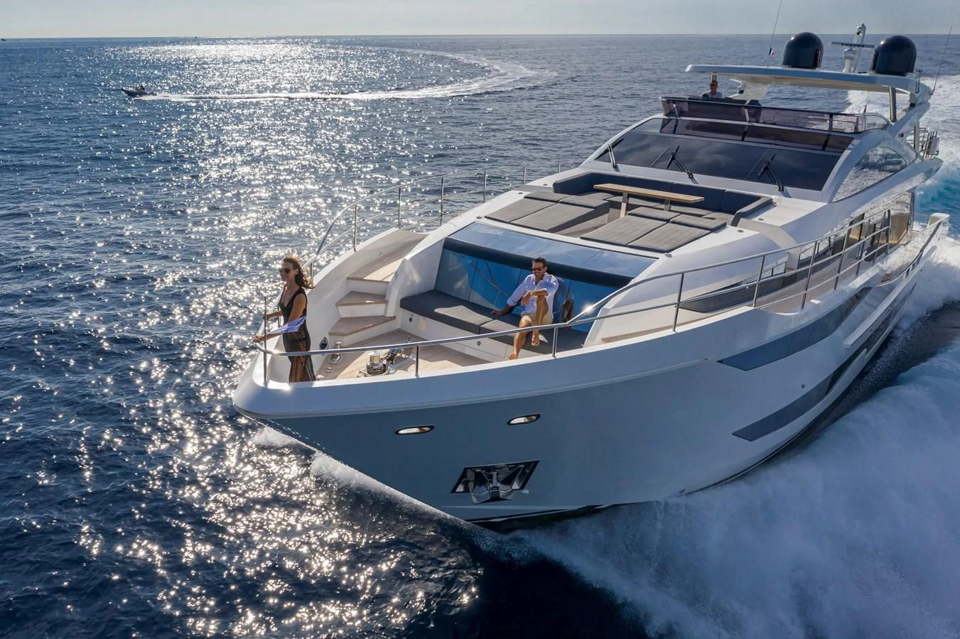 two people standing on a boat aboard AMIRA Yacht for Sale