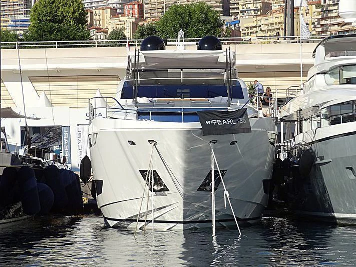 boats docked in a harbor aboard AMIRA Yacht for Sale