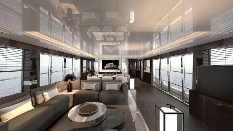 a room with a couch and a table aboard AMIRA Yacht for Sale