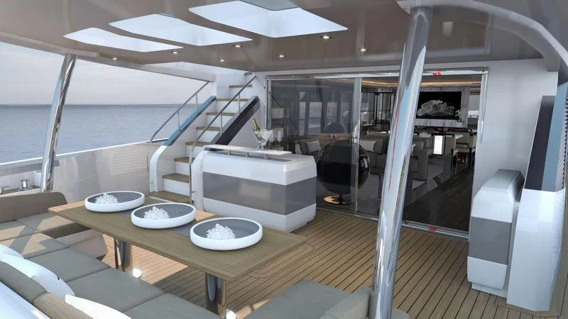 a room with a table and chairs aboard AMIRA Yacht for Sale