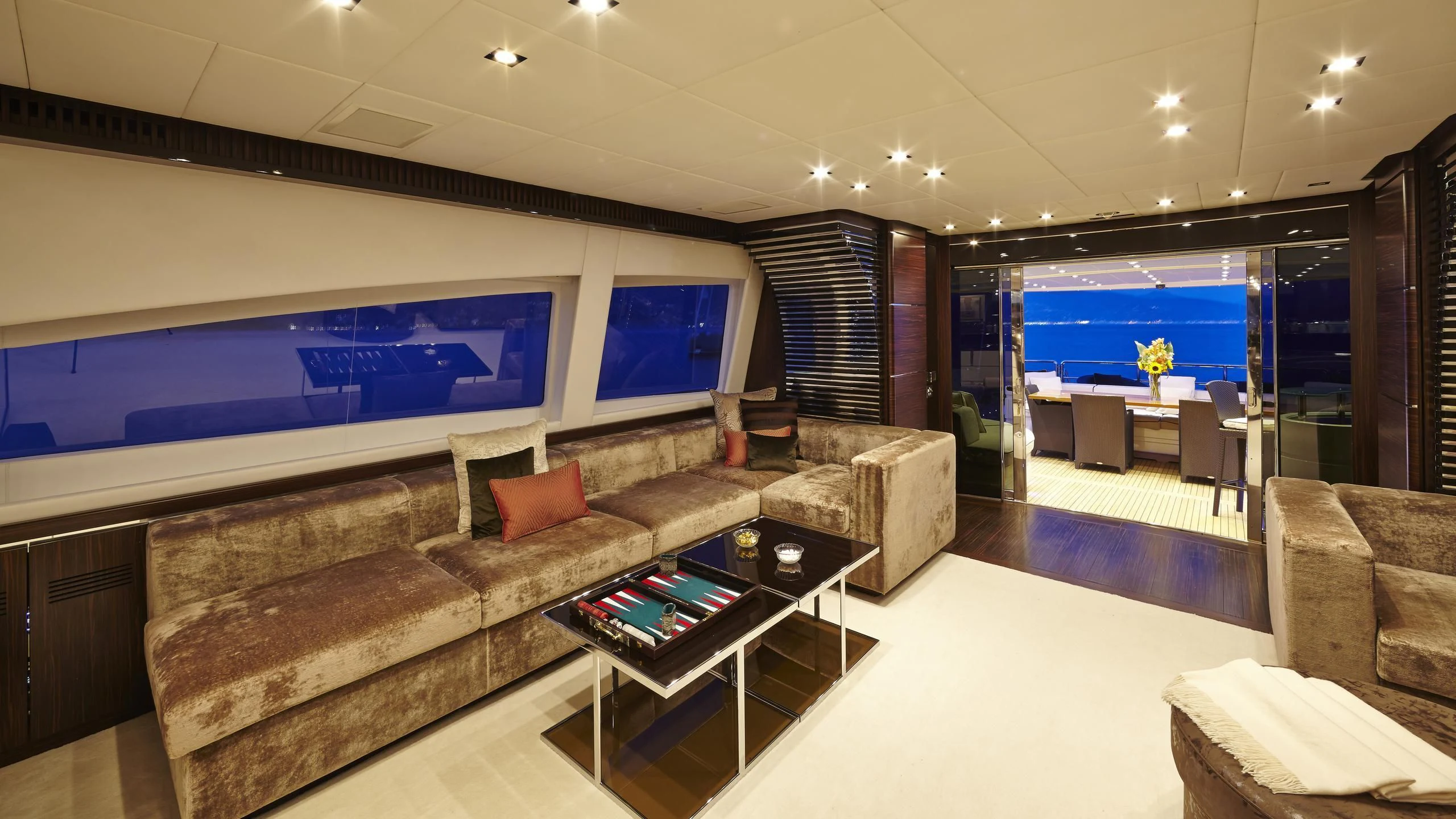 a living room with a couch and a tv aboard ANTELOPE III Yacht for Sale