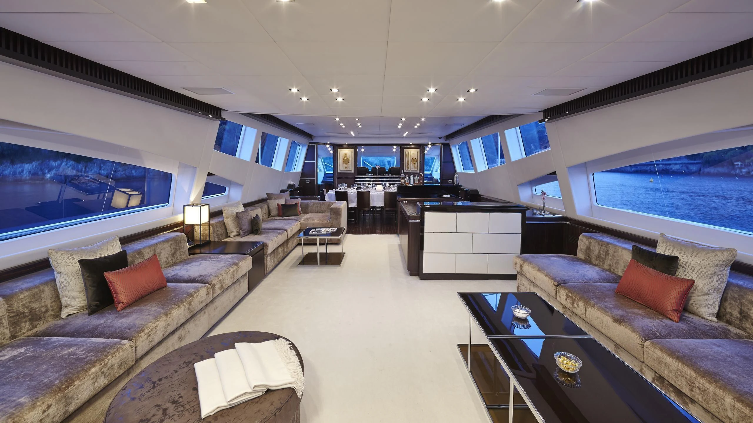 a living room with a large screen aboard ANTELOPE III Yacht for Sale