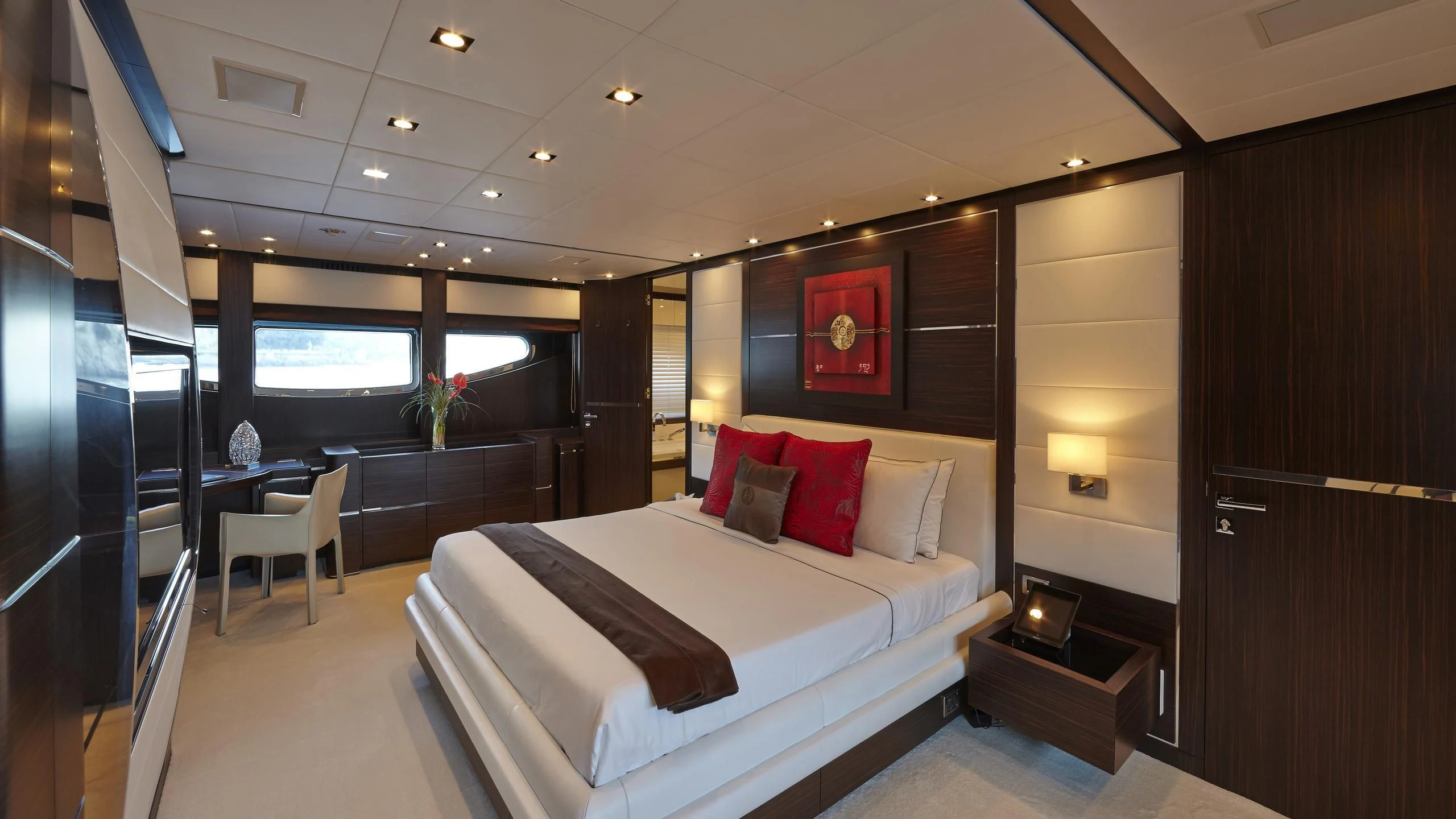 a room with a bed and a desk aboard ANTELOPE III Yacht for Sale