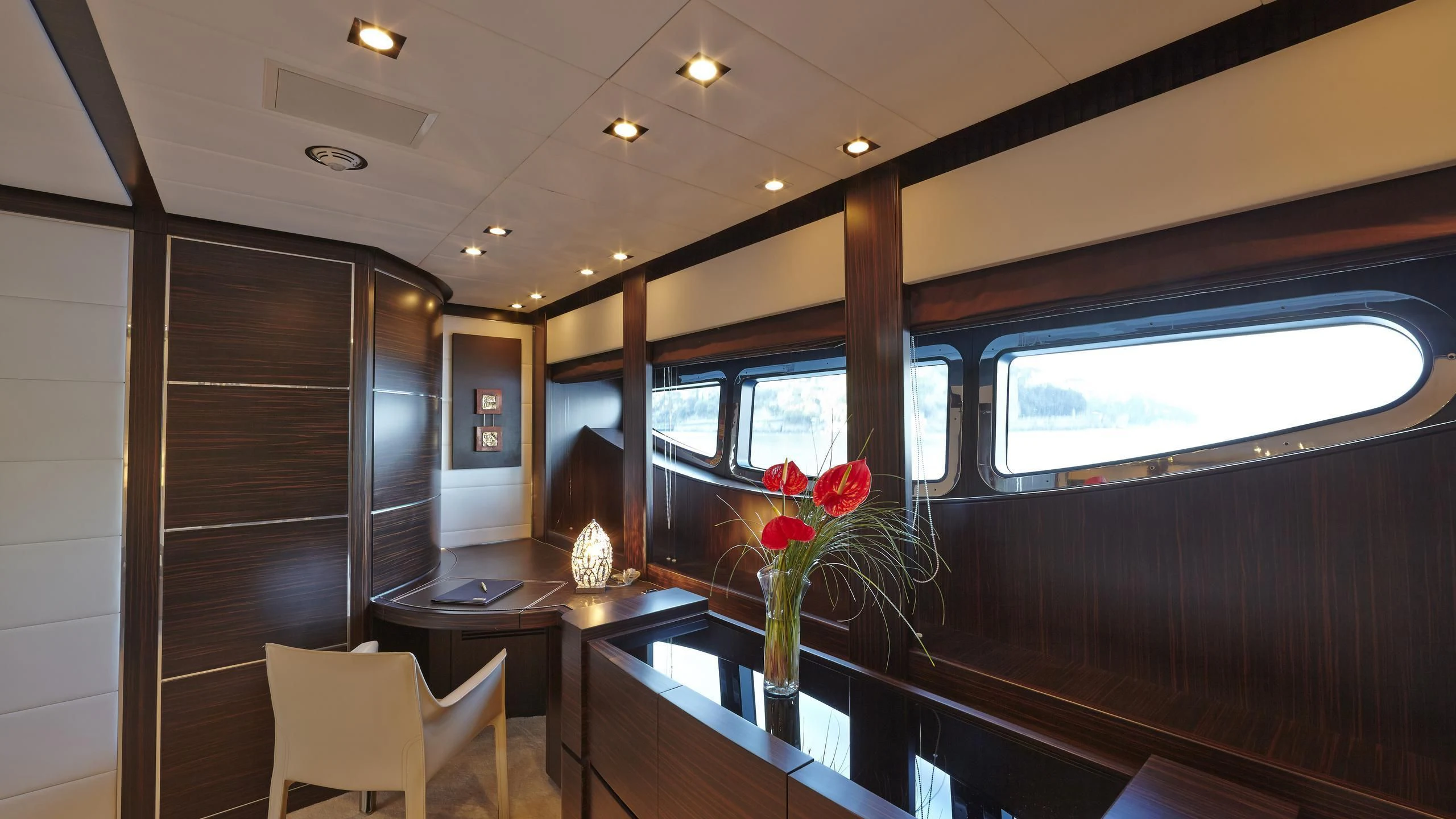 a room with a table and chairs aboard ANTELOPE III Yacht for Sale