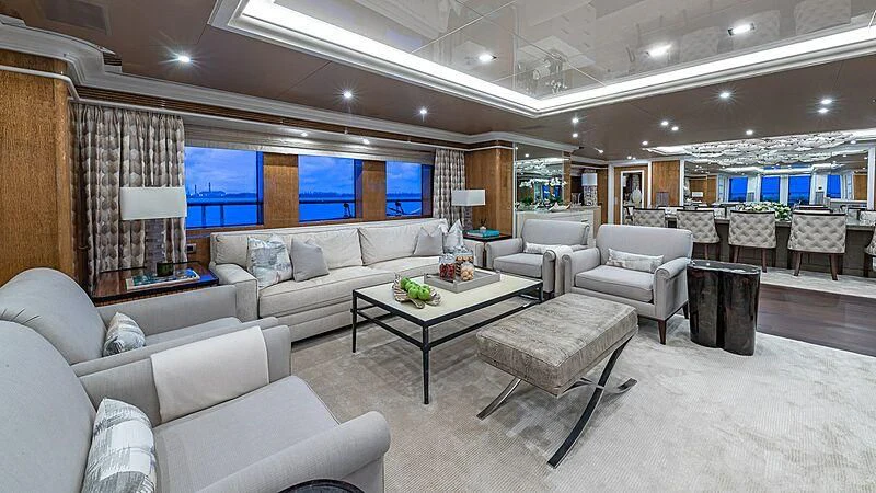a living room with a large window aboard ANDIAMO Yacht for Sale